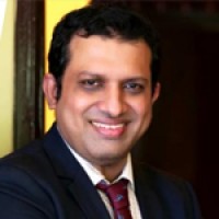 Dr. Mohan T Shenoy